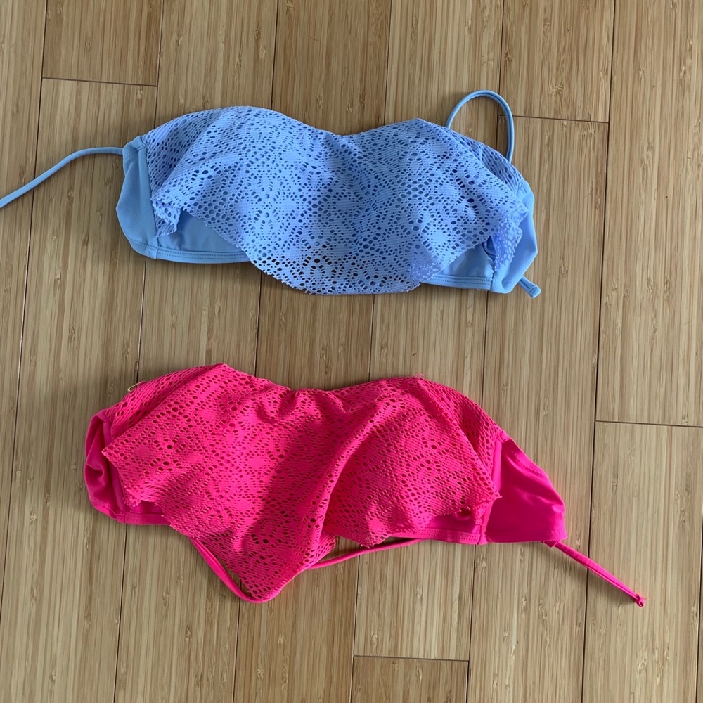 Two strapless swimsuits